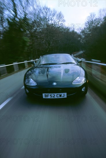 2002 Jaguar XKR coupe. Artist: Unknown.