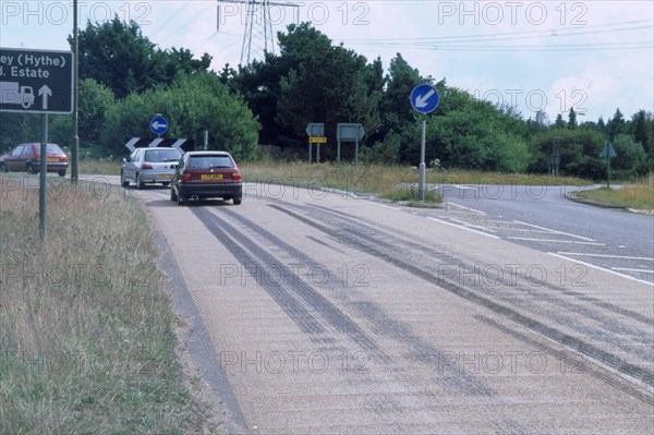 Tyre skidmarks on road surface. Artist: Unknown.