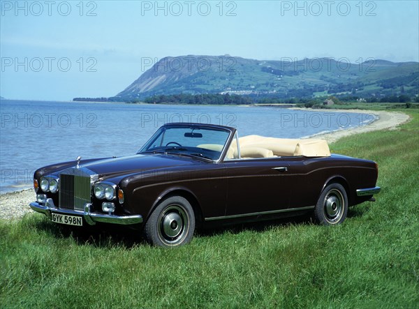 1975 Rolls Royce Corniche convertible. Artist: Unknown.