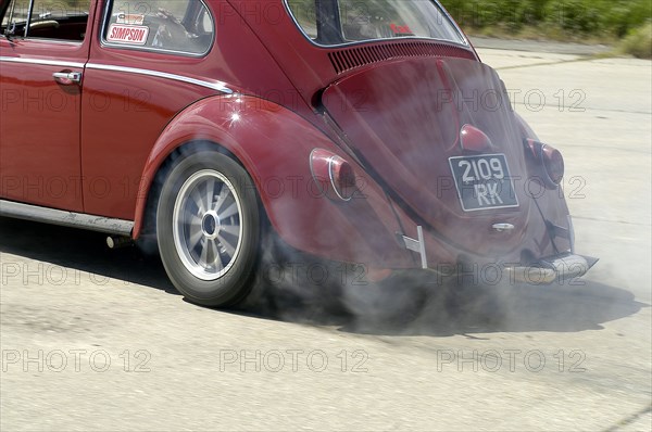 VW Beetle Burning out. Artist: Unknown.