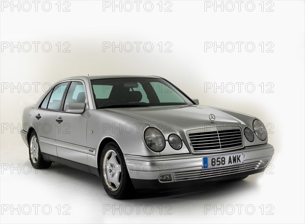 1998 Mercedes Benz E240 Artist: Unknown.