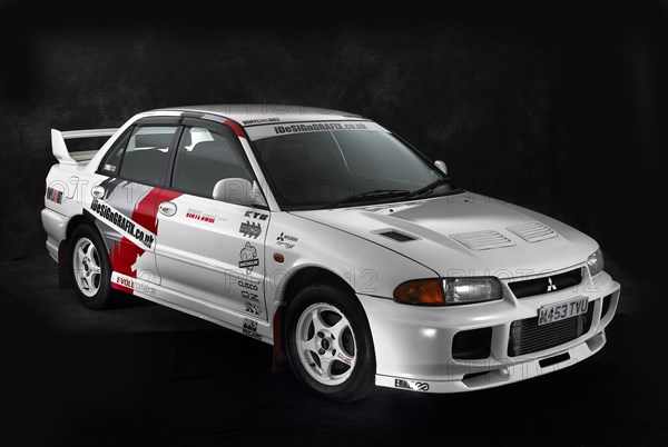 1995 Mitsubishi Lancer Evo 3 Artist: Unknown.