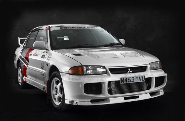 1995 Mitsubishi Lancer Evo 3 Artist: Unknown.