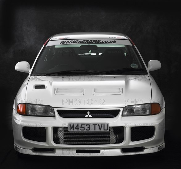 1995 Mitsubishi Lancer Evo 3 Artist: Unknown.