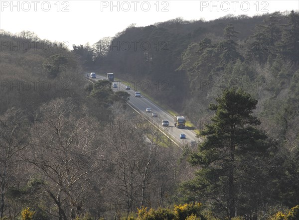 The A31 Dual Carriageway through New Forest Artist: Unknown.