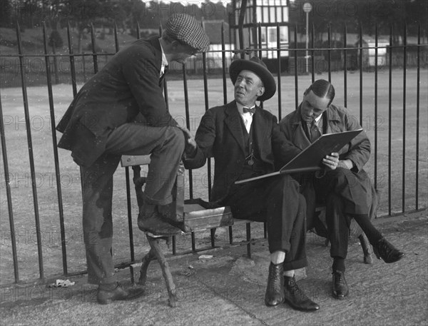 Henry Segrave, and Malcolm Campbell, with motoring artist Frederick Gordon Crosby, Brooklands. Artist: Bill Brunell.