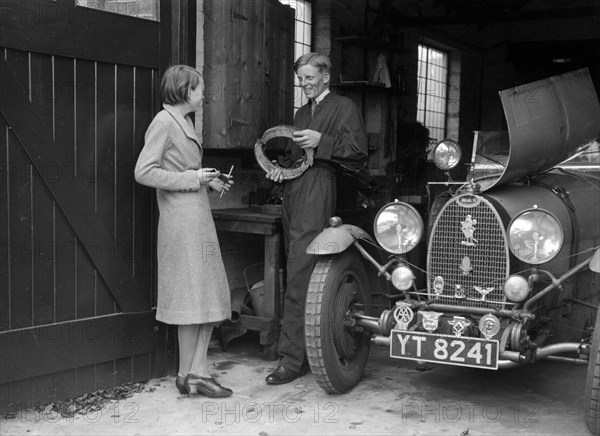 Denis Evans working on his Bugatti Type 43 2262cc. Artist: Bill Brunell.