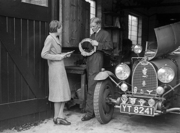 Denis Evans working on his Bugatti Type 43 2262cc. Artist: Bill Brunell.