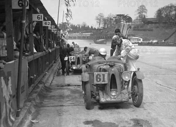 MG C types at the JCC Double Twelve race, Brooklands, 8/9 May 1931. Artist: Bill Brunell.