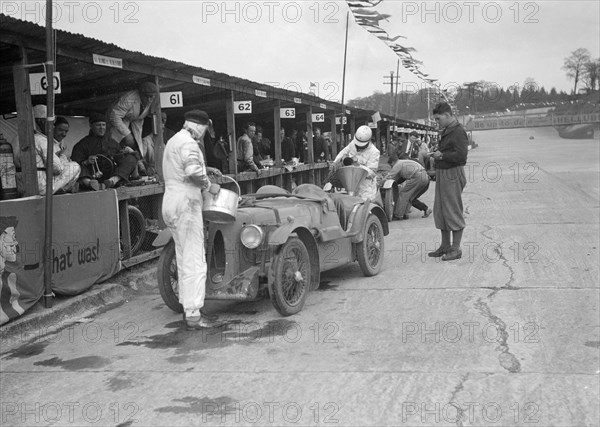 MG C type of the Earl of March and CS Staniland, JCC Double Twelve race, Brooklands, 8/9 May 1931. Artist: Bill Brunell.