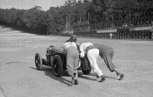 MG C type receiving a push at Brooklands, 1931 Artist: Bill Brunell.