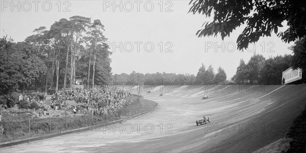 Riley 9 Brooklands on the banking at Brooklands. Artist: Bill Brunell.