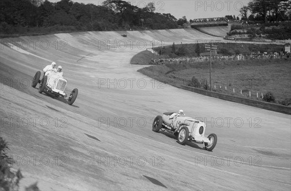 Sunbeam of EL Bouts and Vauhall 30/98 of RJ Munday, BARC meeting, Brooklands, 16 May 1932. Artist: Bill Brunell.