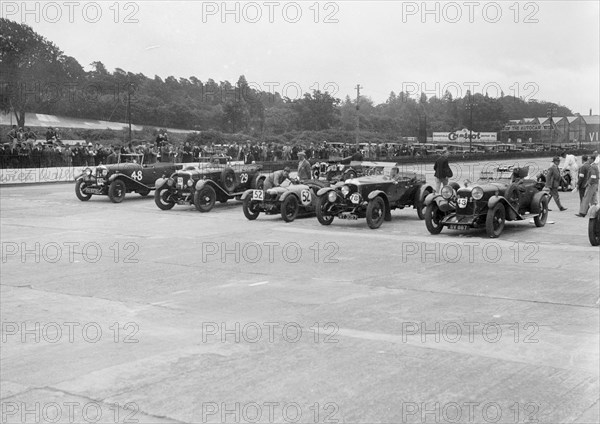 Cars on the start line at the JCC Members Day, Brooklands, 4 July 1931. Artist: Bill Brunell.