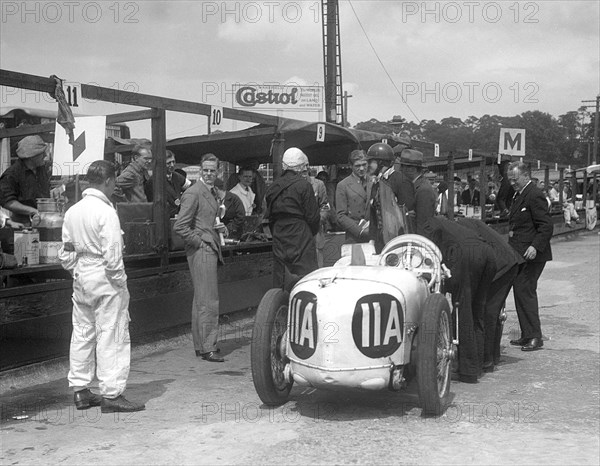 Frazer-Nash of Adrian Malcolm Conan-Doyle at the LCC Relay GP, Brooklands, 25 July 1931. Artist: Bill Brunell.