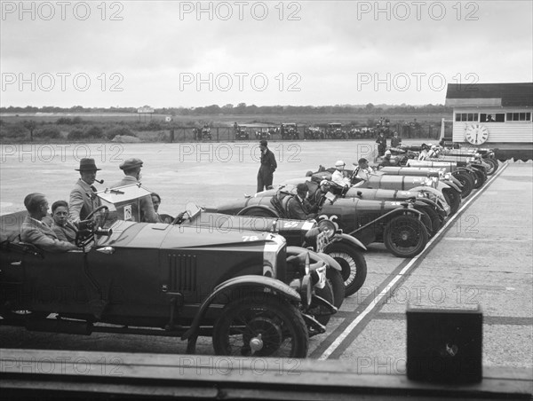 Cars on the start line at the JCC Members Day, Brooklands, 4 July 1931. Artist: Bill Brunell.