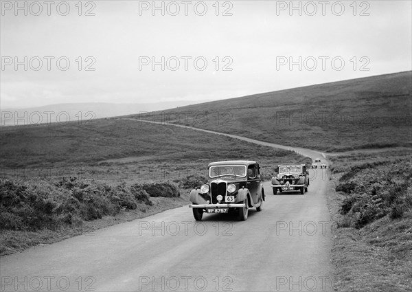 LA Forty's Riley Falcon ahead of J Boardman's Riley Kestrel at the MCC Torquay Rally, July 1937. Artist: Bill Brunell.