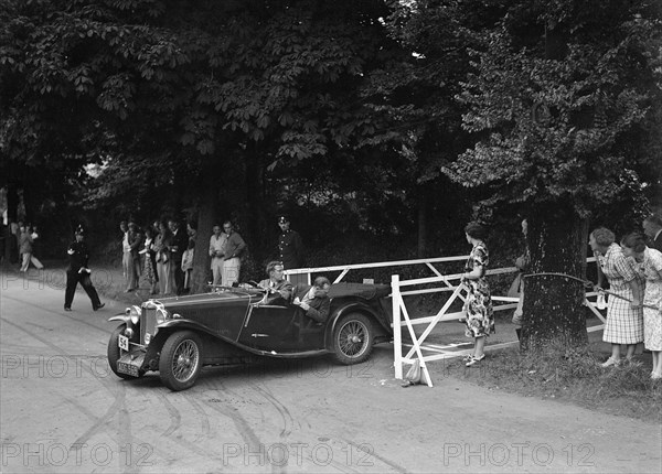 VM Roberts' MG Magnette NA, winner of a bronze award at the MCC Torquay Rally, July 1937. Artist: Bill Brunell.