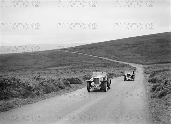 MG Magnette NAs of VM Roberts and FE Ainley at the MCC Torquay Rally, July 1937. Artist: Bill Brunell.