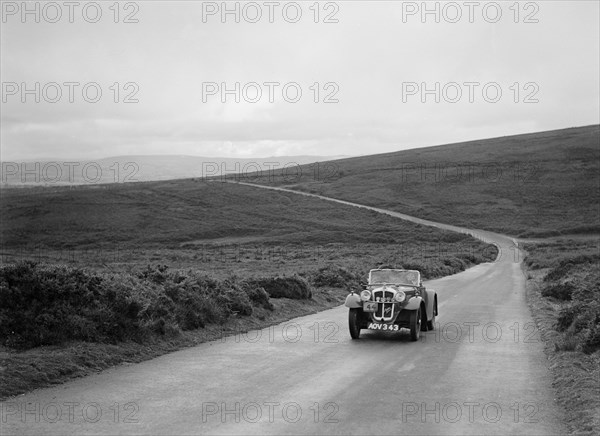 Austin 7 of JG Orford, winner of a premier award at the MCC Torquay Rally, July 1937. Artist: Bill Brunell.