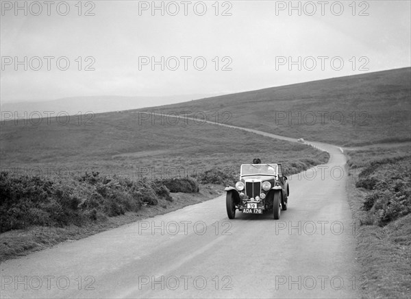 AB Langley's MG Magnette competing at the MCC Torquay Rally, July 1937. Artist: Bill Brunell.