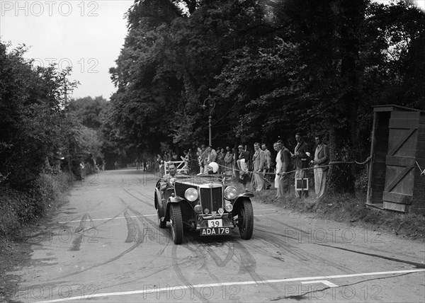 AB Langley's MG Magnette competing at the MCC Torquay Rally, July 1937. Artist: Bill Brunell.