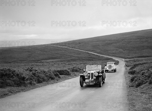 RD Harris' MG Magnette leading RJ Barker's Terraplane at the MCC Torquay Rally, July 1937. Artist: Bill Brunell.