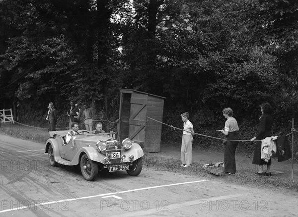 MG Shorey's Riley Lynx, winner of a bronze award at the MCC Torquay Rally, July 1937. Artist: Bill Brunell.