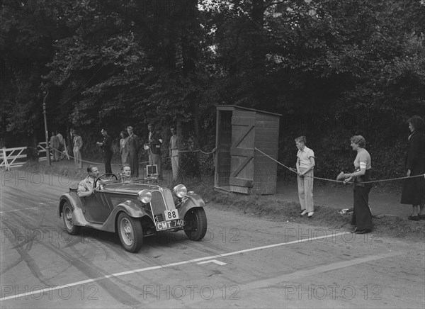 1935 Frazer-Nash BMW of DN Leon competing at the MCC Torquay Rally, July 1937. Artist: Bill Brunell.