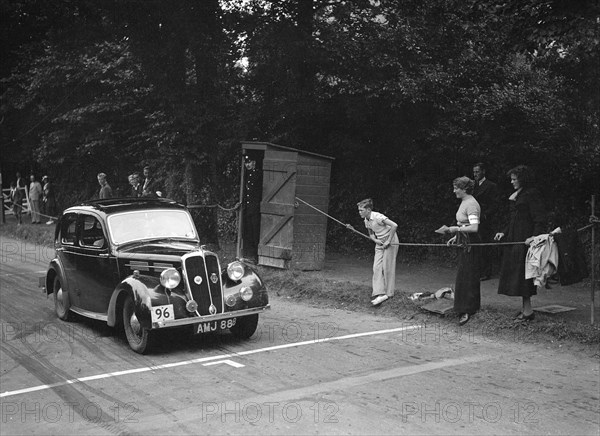 Standard Flying 12 of RS Mantle, winner of a silver award at the MCC Torquay Rally, July 1937. Artist: Bill Brunell.