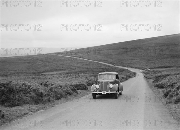 ADC Gordon's Ford V8, winner of a silver award at the MCC Torquay Rally, July 1937. Artist: Bill Brunell.