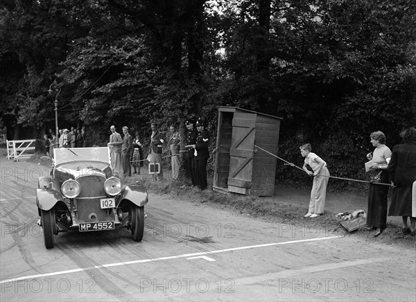 Bentley of FE Elgood, winner of a premier award at the MCC Torquay Rally, July 1937. Artist: Bill Brunell.