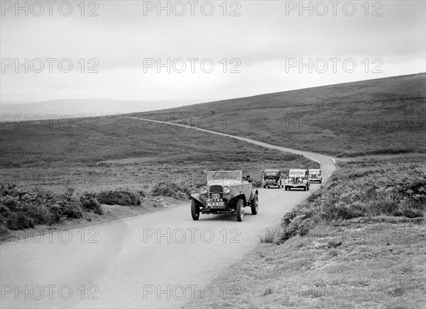 Ford V8s of WCN Norton and J Harrison competing at the MCC Torquay Rally, July 1937. Artist: Bill Brunell.