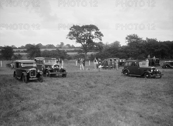 Austin 7 and two Singers taking part in the Bugatti Owners Club gymkhana, 5 July 1931. Artist: Bill Brunell.