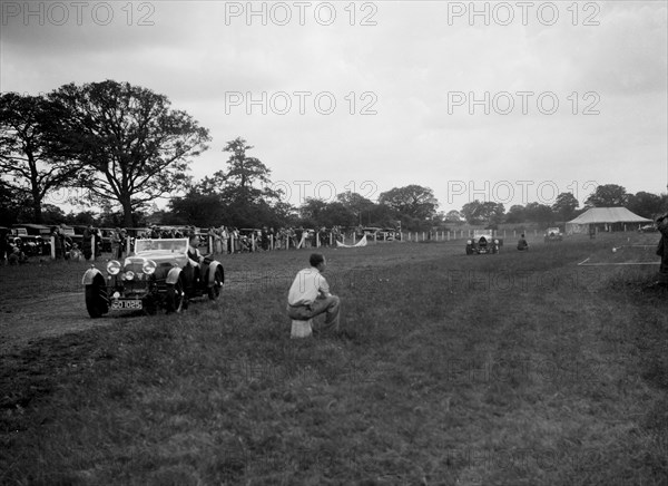 Aston Martin and Bugatti Type 43s taking part in the Bugatti Owners Club gymkhana, 5 July 1931. Artist: Bill Brunell.