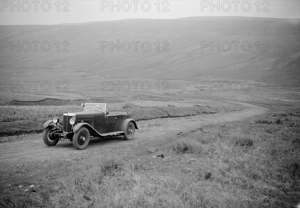 Kitty Brunell road testing a MG 18/80, April 1931. Artist: Bill Brunell.