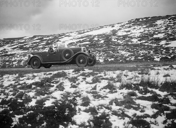 Kitty Brunell road testing a MG 18/80, April 1931. Artist: Bill Brunell.