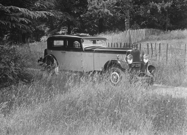 Kitty Brunell road testing a 1931 Delage D8. Artist: Bill Brunell.