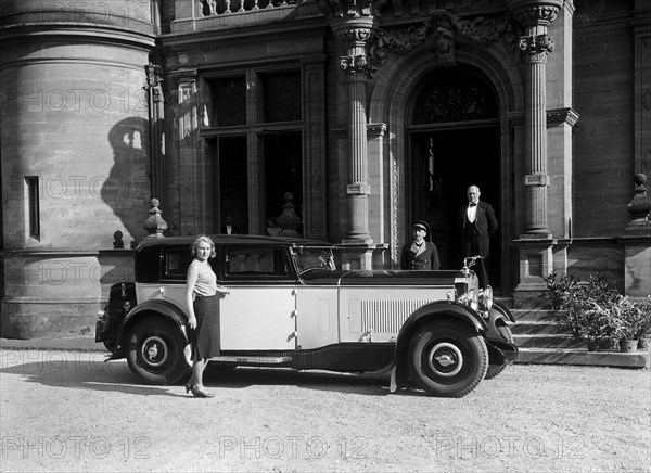 Kitty Brunell road testing a 1931 Delage D8, Wykehurst Place, Bolney, Sussex. Artist: Bill Brunell.