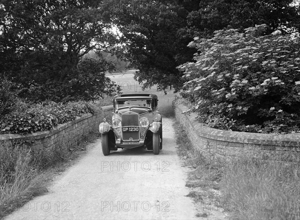 Kitty Brunell road testing a 1931 Delage D8. Artist: Bill Brunell.