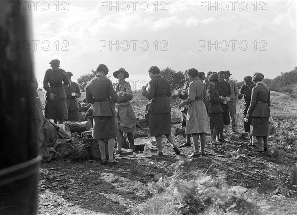 Women at a First Aid Nursing Yeomanry (FANY) trial or rally, 1931. Artist: Bill Brunell.