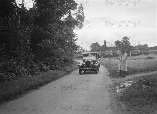 Morris Cowley Tourer taking part in a First Aid Nursing Yeomanry trial or rally, 1931. Artist: Bill Brunell.