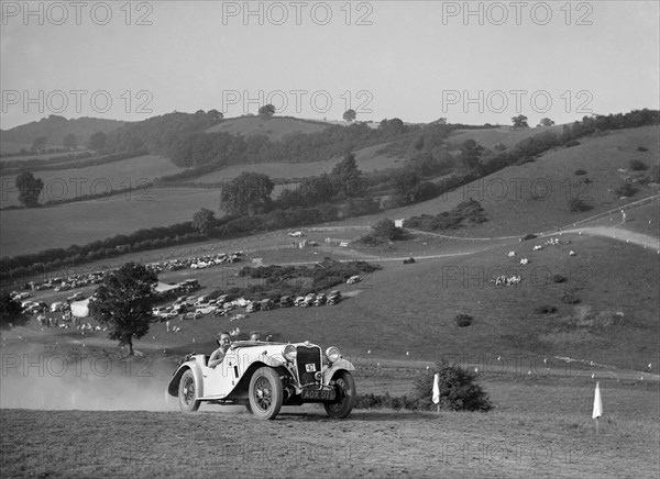 Singer competing in the Singer CC Rushmere Hill Climb, Shropshire 1935. Artist: Bill Brunell.