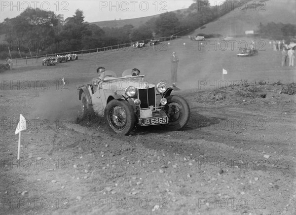 MG of L Welch of the Three Musketeers team at the Singer CC Rushmere Hill Climb, Shropshire 1935. Artist: Bill Brunell.