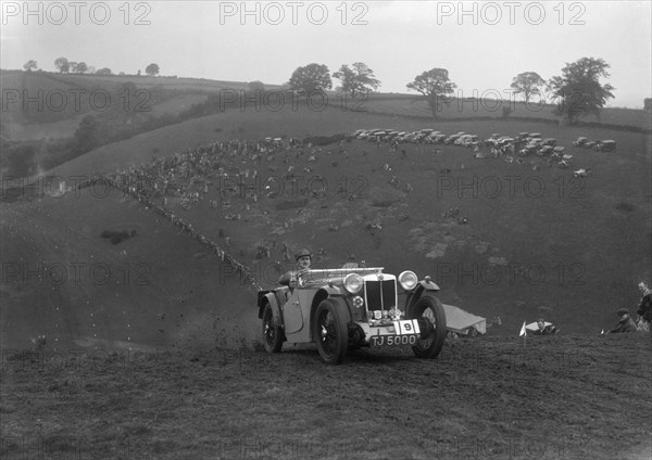 Cream Cracker Team MG PA of JM Toulmin at the Singer CC Rushmere Hill Climb, Shropshire 1935. Artist: Bill Brunell.