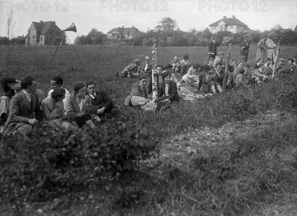 Spectators at the Bugatti Owners Club Hill Climb, Chalfont St Peter, Buckinghamshire, 1935. Artist: Bill Brunell.