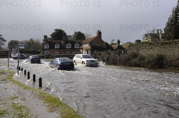 Vehicles on Flooded road at Beaulieu 2008. Artist: Unknown.