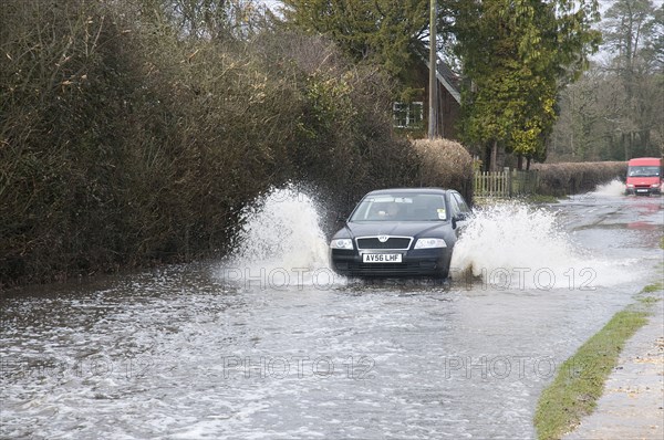 Skoda driving fast through floodwater at Beaulieu 2008. Artist: Unknown.