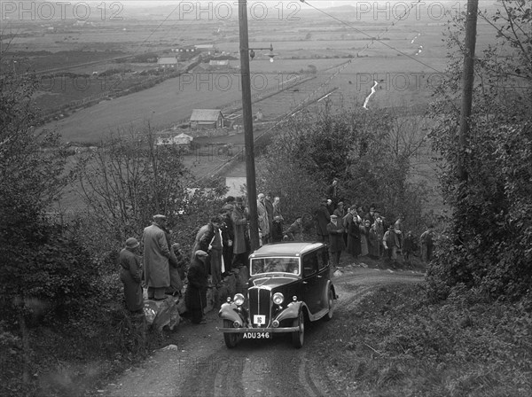 1934 Standard Ten taking part in a Standard Car Owners Club trial. Artist: Bill Brunell.