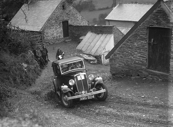 1933 Standard saloon taking part in a Standard Car Owners Club trial. Artist: Bill Brunell.